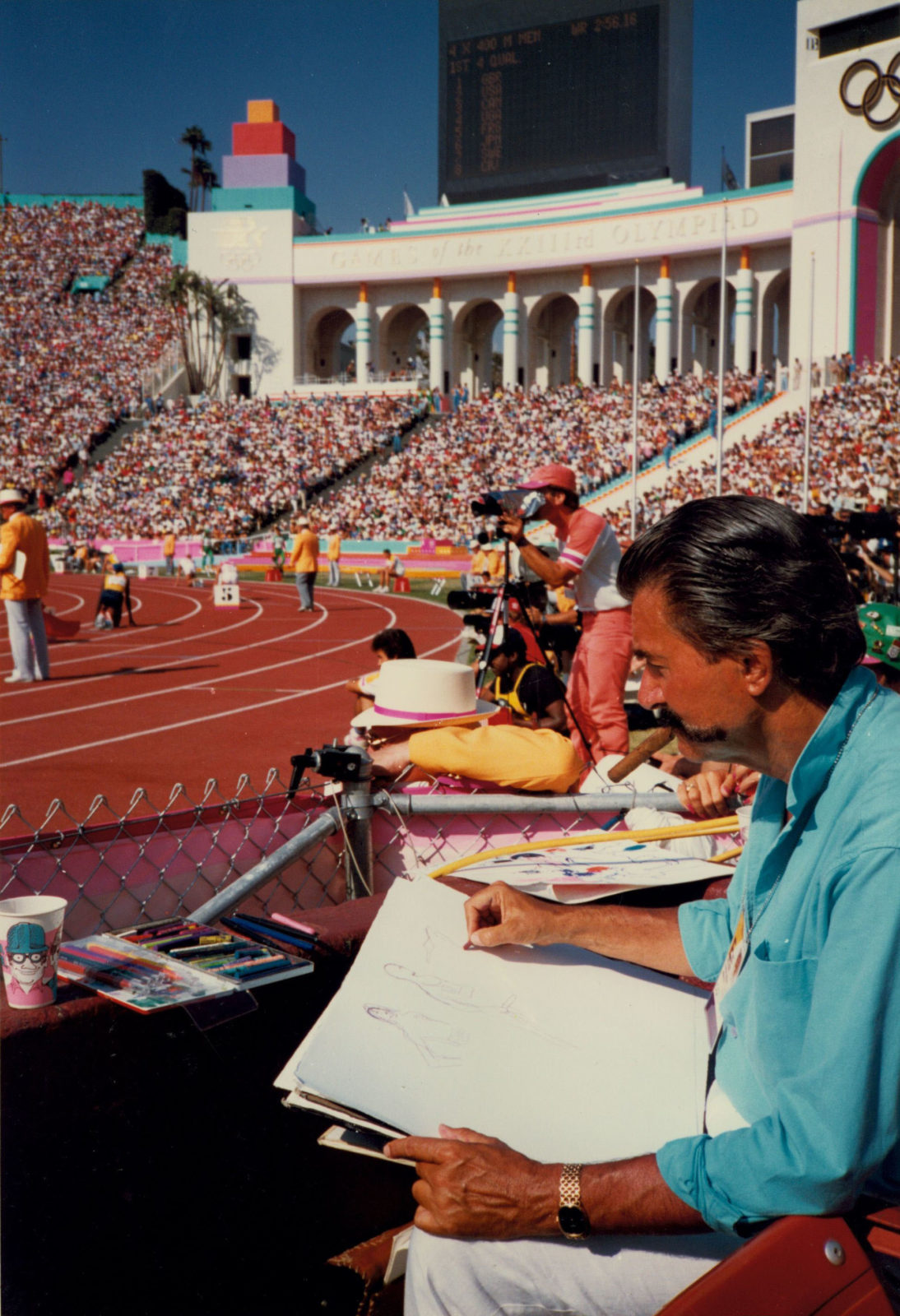 LeRoy Neiman sketching at the 1984 Olympics